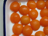 健康によって缶詰にされる杏子の半分は、自然な味および好み缶詰食品のかさ張ります